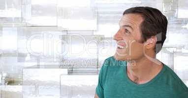 Man looking up with glass cube background