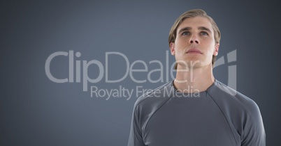 Man looking up with grey background Man looking up with grey background
