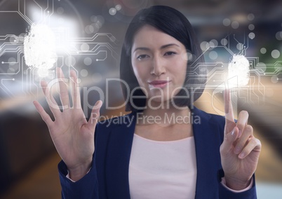 Finger ID interface and Businesswoman touching air in front of office