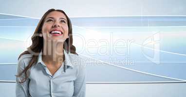 Woman looking up with clean blue swished background