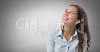 Woman looking up with grey background
