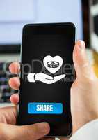 Hand using phone with share button for hand giving heart money