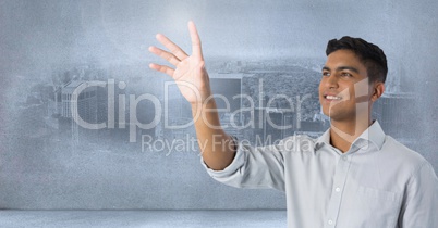 Businessman touching air in front of city