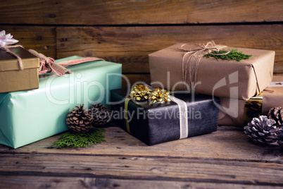 Gift boxes on wooden plank