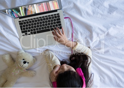 kid using bookshelf on laptop screen