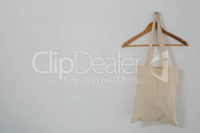 Beige bag on hanger