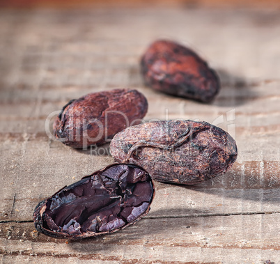 Cocoa beans on a wooden table