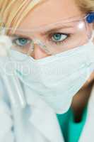 Female Scientific Research Scientist With Test Tube In Laborator