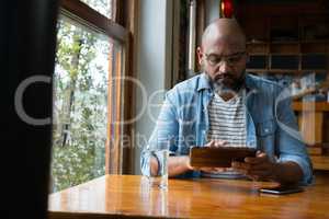 Man using digital tablet