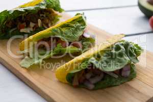 Mexican tacos on wooden tray