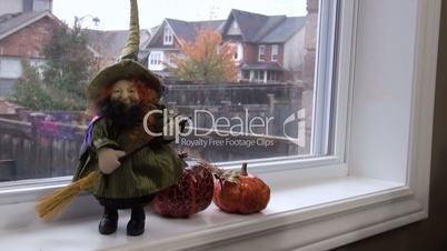 Autumn, soon Halloween, toys are already on the windowsill.
