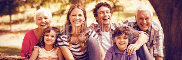 Portrait of smiling family having picnic