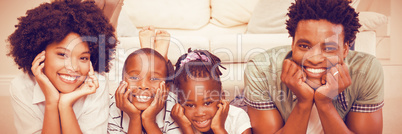 Happy family lying on the floor