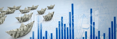 Group of money dollar Paper boats on bar chart statistics