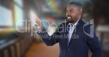 Businessman touching air in front of room