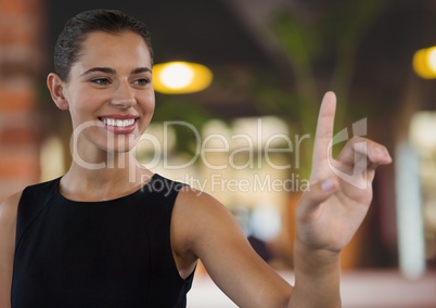 Businesswoman touching air in front of cafe