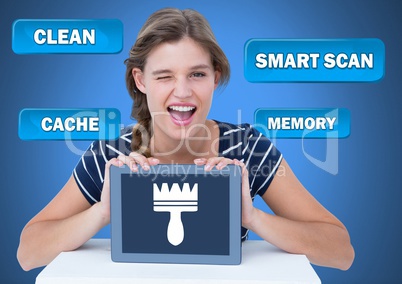 Woman holding tablet with Clean cache scan buttons and brush