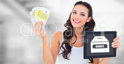 Woman holding tablet with donate box and money notes