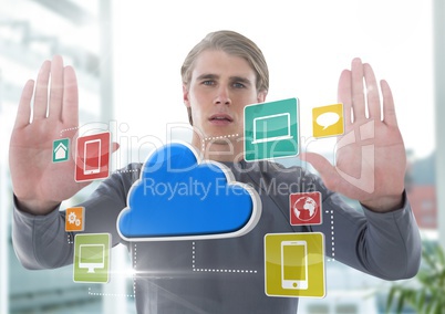 App icons and Businessman holding hands up in front of office