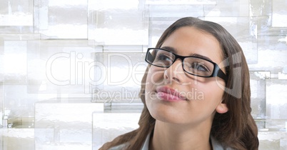 Woman looking up with glass cubes background