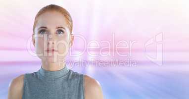 Woman looking up with soft motion background