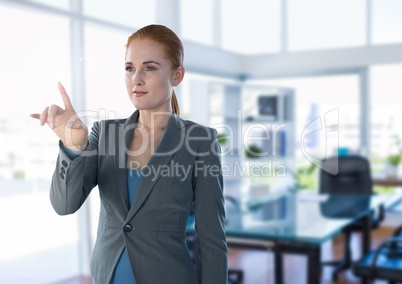 Businesswoman touching air in front of office