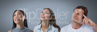 People looking up with grey background