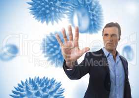 Businessman touching air with open hand in front of science micro organisms