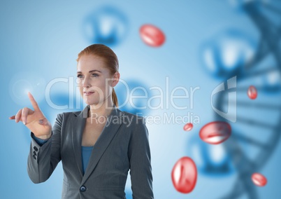 Businesswoman touching air in front of science micro organisms