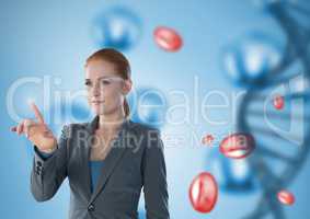 Businesswoman touching air in front of science micro organisms