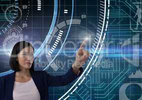 Businesswoman touching air in front of technology science interfaces