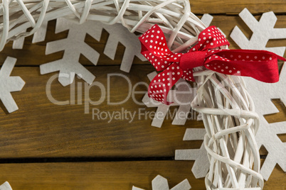 Cropped image of wreath decoration on artificial snow flake