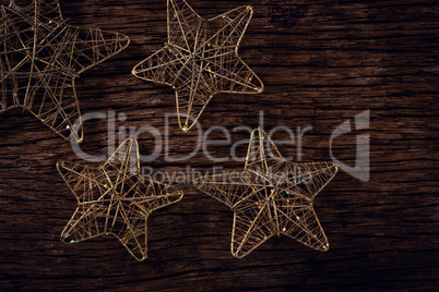 Handmade stars on wooden plank