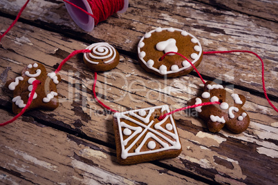 Various christmas cookies arranged in thread