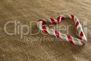 Heart shaped candy cane on on fabric