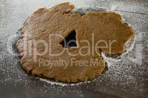 Raw cookie dough with christmas tree shaped hole