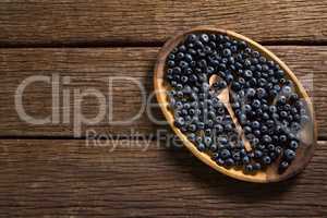 Blueberries in wooden plate