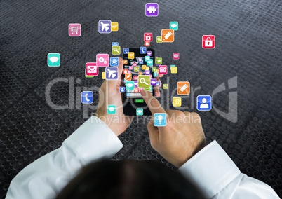 Man with phone on  hands and applications icons coming up from it