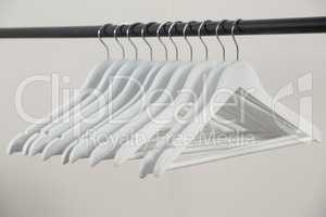 Hangers arranged on clothes rack