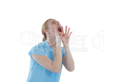 Female executive shouting against white background