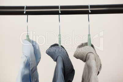 Close-up of shirts hanging on hanger