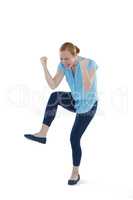 Female executive dancing against white background