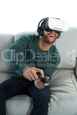 Man playing video game with virtual reality headset