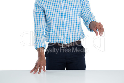 Male executive trying to hold the digital tablet Male executive trying to hold the digital tablet