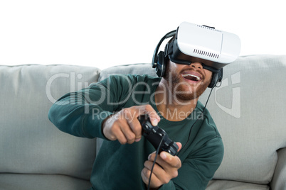 Man playing video game with virtual reality headset