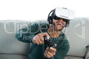 Man playing video game with virtual reality headset