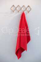 Pink towel hanging on hook