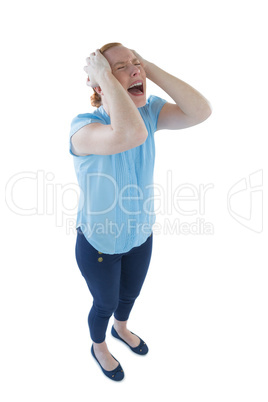 Female executive shouting against white background