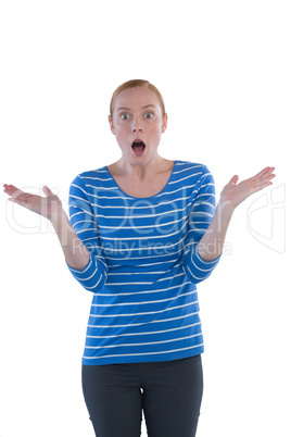 Woman with shocked facial expression making hand gestures