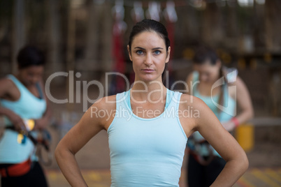 Confident woman standing in park